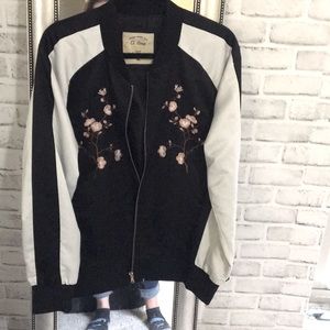 A Black and White Cherry Blossom Bomber Jacket